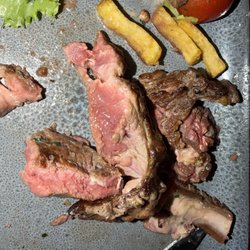 Brasserie "Le Village" - I ordered medium rare and got this rare flesh with a bunch of gristle.