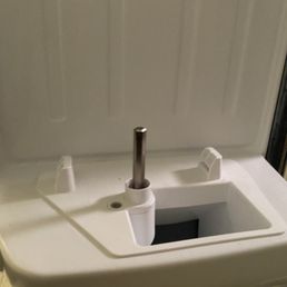 Freezer ice maker post was jammed up After taking ice bucket off to dump ice . It was removed and lowered down . Thank you Allen !