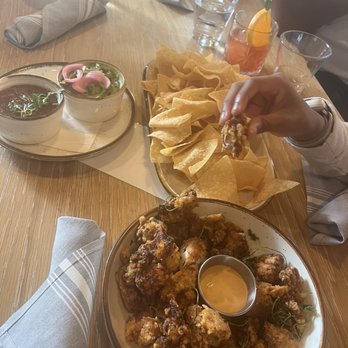 Hatch Cantina - Popcorn chicken, chips, salsa and guacamole- soooo good and it's gluten free - Bars Near Me - Seattle, Washington