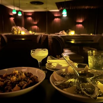 Driftwood Room - two plates of food on a table - Lounges Near Me - Portland, Oregon