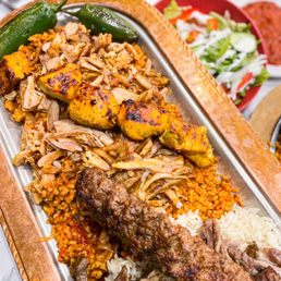a platter of meat and rice a platter of meat and rice