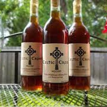 Celtic Cross Meadery - three bottles of wine on a table - Wine Tasting Room Near Me - League City, Texas
