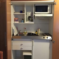 Zum Grünen Haag Hotel Garni - Full kitchenette; hidden behind closed cabinet doors. Just buy your own groceries. :)