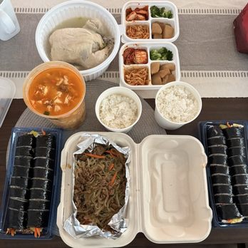 Sue’s Korean Kitchen - Samgyetang (Korean ginseng soup), banchan, beef gimbap, japchae, and Sue's gimbap (fish cake, crab meat and ham) - Korean Near Me - San Diego, California Sue’s Korean Kitchen - Samgyetang (Korean ginseng soup), banchan, beef gimbap, japchae, and Sue's gimbap (fish cake, crab meat and ham) - Korean Near Me - San Diego, California
