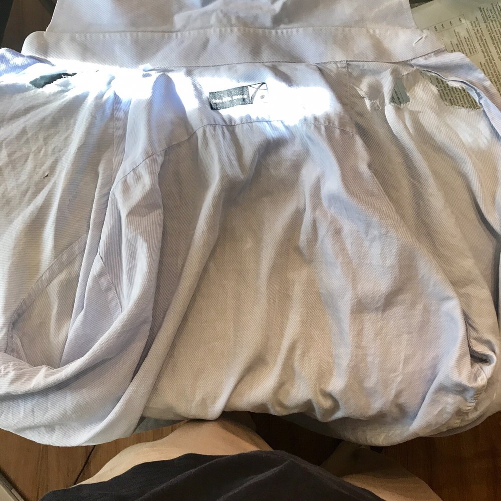 This is what the shirt looked like after returned. What they said was a broken shirt.