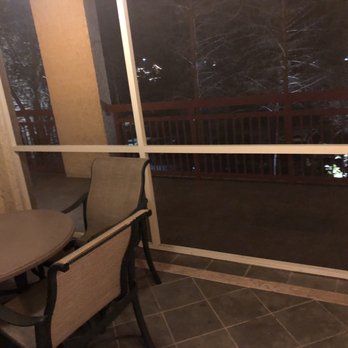 Riverstone Resort & Spa - Screened in front porch and table. - Hotels Near Me - Pigeon Forge, Tennessee Riverstone Resort & Spa - Screened in front porch and table. - Hotels Near Me - Pigeon Forge, Tennessee