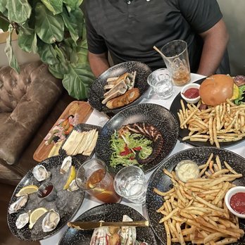 Tavern On Main - Roasted Bone Marrow, Tavern Burger, Frites, Radicchio Salad, Oysters, Grilled Octopus. - New American Near Me - Springfield, Oregon Tavern On Main - Roasted Bone Marrow, Tavern Burger, Frites, Radicchio Salad, Oysters, Grilled Octopus. - New American Near Me - Springfield, Oregon