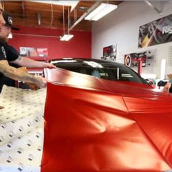 Rightlook Auto Appearance and Auto Detailing Training - Students learn by doing in vehicle wrap class.
