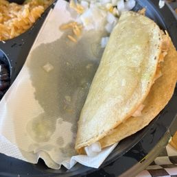 Greasy hardshell taco. I put the napkin to try to absorb some of the grease. But it was just too much. Greasy hardshell taco. I put the napkin to try to absorb some of the grease. But it was just too much.