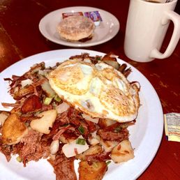 Corned beef hash with 2 eggs & buttered English muffin. Perfection! Corned beef hash with 2 eggs & buttered English muffin. Perfection!