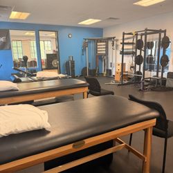 Empower Physical Therapy - Multiple tables and advanced lifting equipment