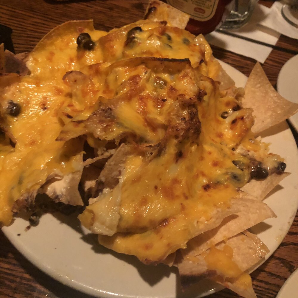 Skips - Chicken nachos. Picture doesn't do them justice. I had already started eating them. - Desserts Near Me - Des Moines, Iowa Skips - Chicken nachos. Picture doesn't do them justice. I had already started eating them. - Desserts Near Me - Des Moines, Iowa