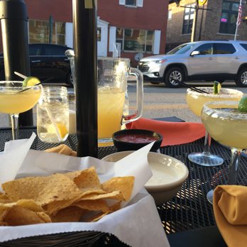 Agave Bar and Grill - A pitcher of agave margaritas, chips and salsa, and queso dip. - Mexican Near Me - Carmel, Indiana