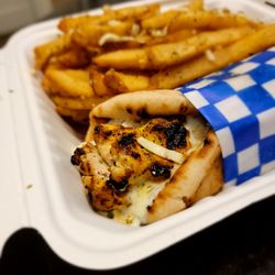 Ithaka Greek Restaurant - Am-mazing! Chicken Souvlaki Pita. No onions and added feta. Subbed fries for Greek Fries.
