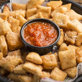 Rosati's Pizza - a plate of cheese crackers with a dipping sauce - Pizza Near Me - Hoschton, Georgia Rosati's Pizza - a plate of cheese crackers with a dipping sauce - Pizza Near Me - Hoschton, Georgia