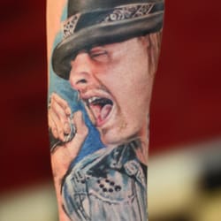 London Blue Lady Tattoo & Piercing - realistic portrait tattoos by Mirek vel Stotker
