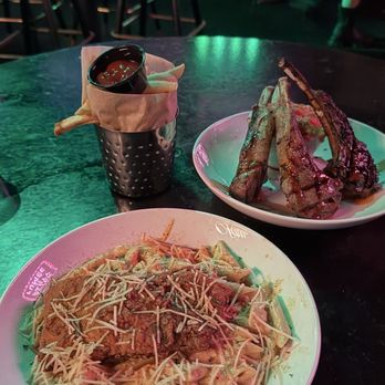 STATS Restaurant & Bar - STATS Cajun Alfredo with fried salmon & Cast Iron Lamb Chops - Sports Bars Near Me - Charlotte, North Carolina STATS Restaurant & Bar - STATS Cajun Alfredo with fried salmon & Cast Iron Lamb Chops - Sports Bars Near Me - Charlotte, North Carolina