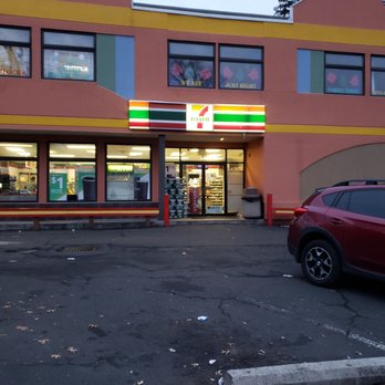 7-Eleven - a car parked in front of a convenience store - Convenience Stores Near Me - Rutherford, New Jersey