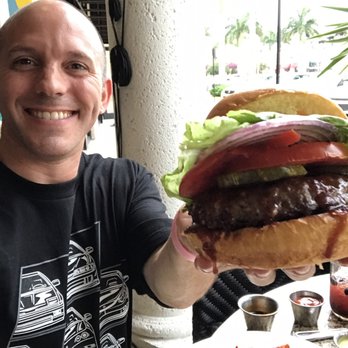 Burt & Max's - Enjoying a juicy burger - Bars Near Me - Delray Beach, Florida