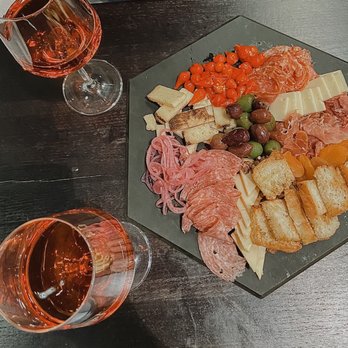 The Purveyor - Full charcuterie board with rosé - Desserts Near Me - Des Moines, Iowa