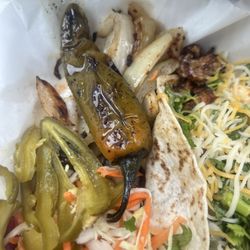 Taqueria El Trompo - Unexpected peppers, cabbage, onions...that pepper was HOT!! I loved it