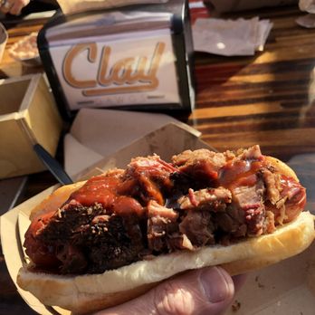 Caldwell County Mexi-Q - The brisket topped hotdog with BBQ sauce. - Barbeque Near Me - Gilbert, Arizona Caldwell County Mexi-Q - The brisket topped hotdog with BBQ sauce. - Barbeque Near Me - Gilbert, Arizona