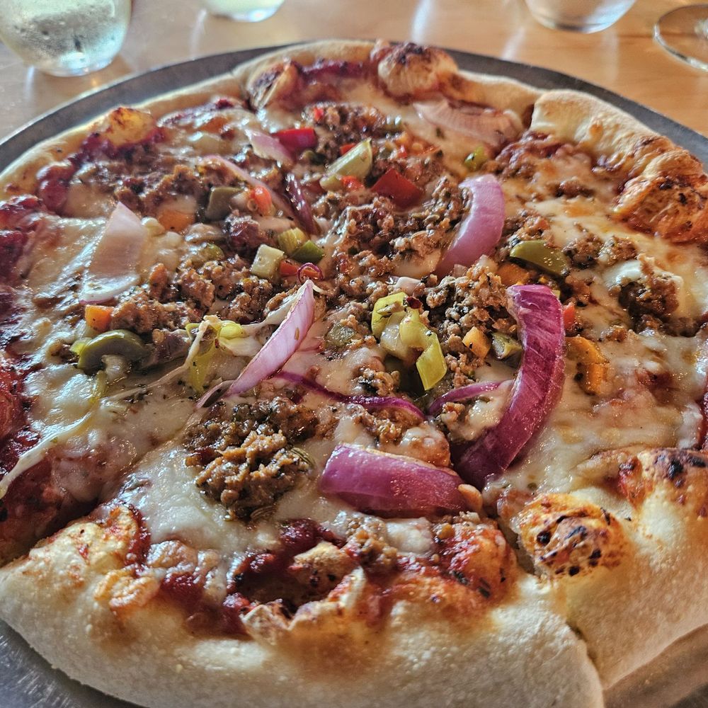 Taproot Cider House - Fennel sausage pizza - Bars Near Me - Traverse City, Michigan Taproot Cider House - Fennel sausage pizza - Bars Near Me - Traverse City, Michigan