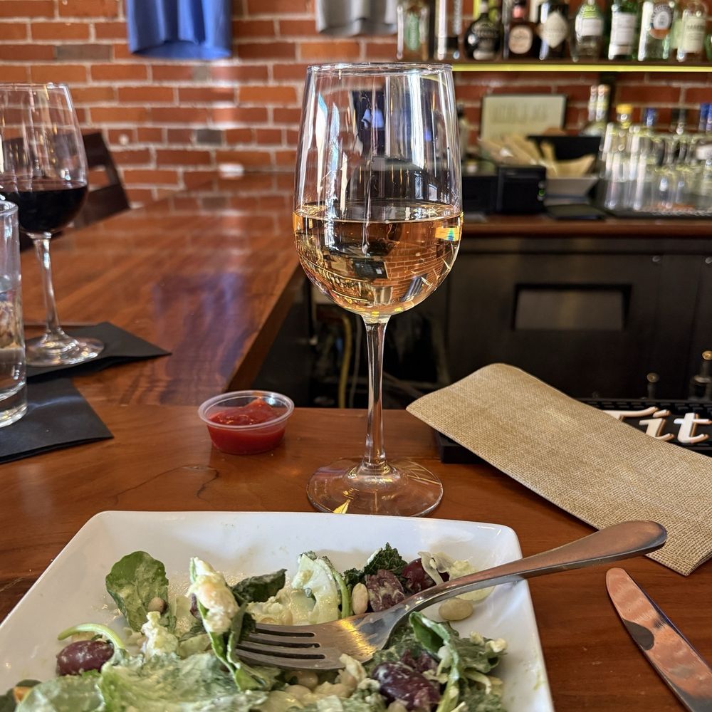 August Forest Rosé, house salad, bar area