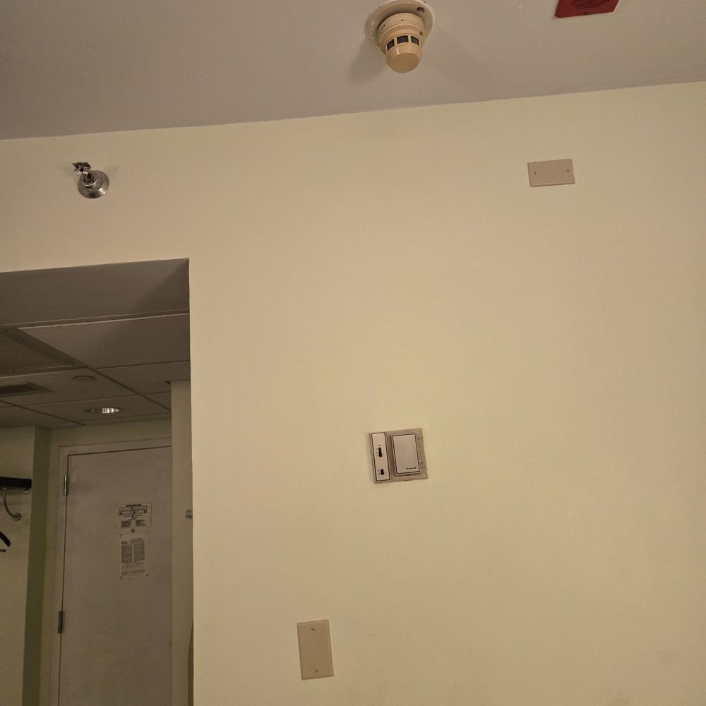 Miami Airport Hotel - What is all this crap? A speaker on the ceiling? Multiple plates covering nothing. - Hotels Near Me - Miami, Florida Miami Airport Hotel - What is all this crap? A speaker on the ceiling? Multiple plates covering nothing. - Hotels Near Me - Miami, Florida