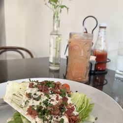 Shot and Bottle - WEDGE SALAD gf Iceberg wedge, chopped bacon, cherry tomatos, chives, and house made bleu cheese dressing