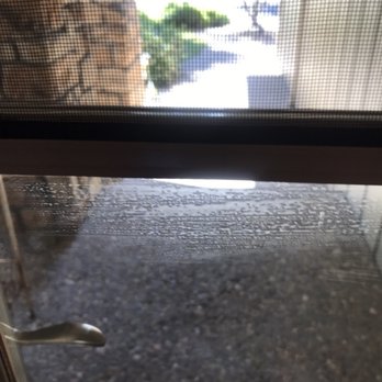 Squeegee Master - This is my glass storm door after he left you can see the sponge marks - Window Washing Near Me - Santa Rosa, California