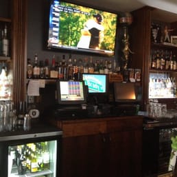 a bar with a flat screen tv