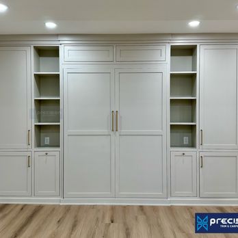 Precision Trim and Carpentry - The Murphy bed folds away quietly and quickly and easily. It's almost effortless. - Handyman Near Me Precision Trim and Carpentry - The Murphy bed folds away quietly and quickly and easily. It's almost effortless. - Handyman Near Me