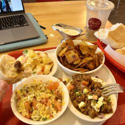 The breakfast combo...from the oven fresh french bread, spicy scrambed eggs, PERFECT fuul, potato salad and fried doughy things!