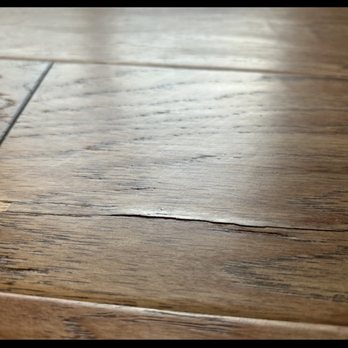 Lombardo Homes - New floor cracked and peeling - Real Estate Services Near Me - Shelby Township, Michigan Lombardo Homes - New floor cracked and peeling - Real Estate Services Near Me - Shelby Township, Michigan