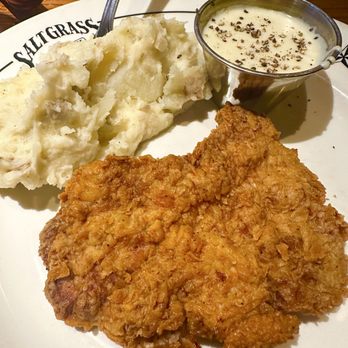 Saltgrass Steak House - Chicken fried steak, lunch portion with gravy on the side. Yum! - Steakhouses Near Me - Humble, Texas Saltgrass Steak House - Chicken fried steak, lunch portion with gravy on the side. Yum! - Steakhouses Near Me - Humble, Texas