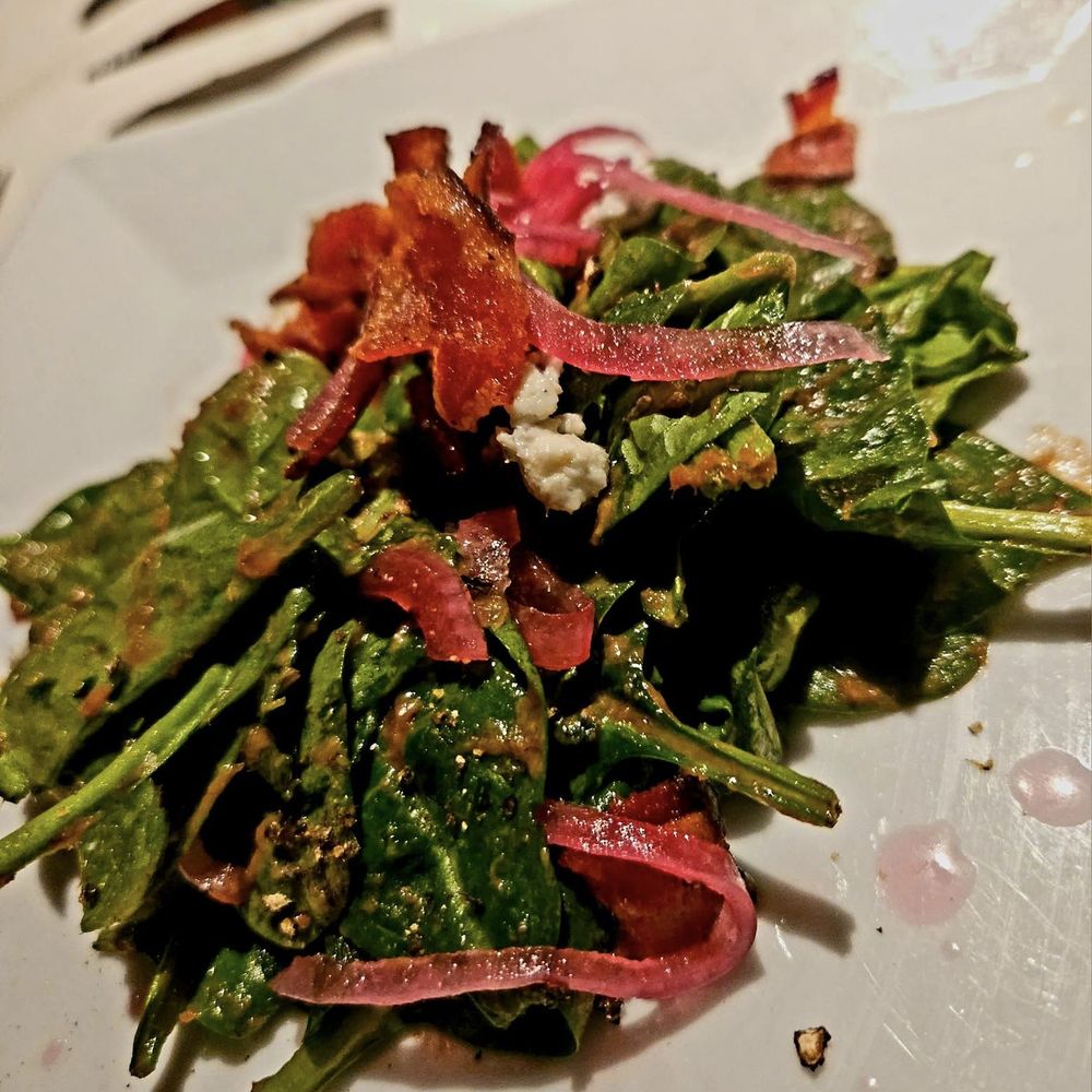 NoJa - Spinach Salad with applewood smoked bacon, shallots, blue cheese and bacon vinaigrette. - New American Near Me - Mobile, Alabama NoJa - Spinach Salad with applewood smoked bacon, shallots, blue cheese and bacon vinaigrette. - New American Near Me - Mobile, Alabama