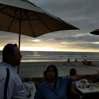 Poseidon on the Beach - On the patio. There is lots of seating with a beach view. - Seafood Near Me - Del Mar, California Poseidon on the Beach - On the patio. There is lots of seating with a beach view. - Seafood Near Me - Del Mar, California