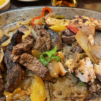 El Tio Tex Mex Grill - Chicken and Steak Fajitas w/ spanish onions, wonderful! - Tex-Mex Near Me - McLean, Virginia El Tio Tex Mex Grill - Chicken and Steak Fajitas w/ spanish onions, wonderful! - Tex-Mex Near Me - McLean, Virginia