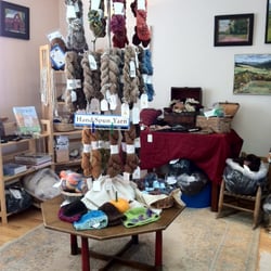 A Spinner's Barn - Alpaca yarn and wearables, plus a gallery of local artwork for sale.
