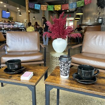 Black Rose Cafe & Bar - Cozy Seating in the front of the cafe. - Bars Near Me - Locust Grove, Georgia Black Rose Cafe & Bar - Cozy Seating in the front of the cafe. - Bars Near Me - Locust Grove, Georgia