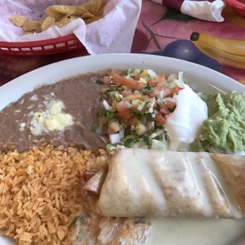 El Mezon - Chicken Chimichanga with rice and beans. - Mexican Near Me - St Peters, Missouri El Mezon - Chicken Chimichanga with rice and beans. - Mexican Near Me - St Peters, Missouri