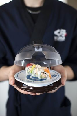 Kura Revolving Sushi Bar by null