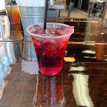 Kentucky Mist Distillery - a drink in a plastic cup with a straw - Distilleries Near Me - Orange Beach, Alabama Kentucky Mist Distillery - a drink in a plastic cup with a straw - Distilleries Near Me - Orange Beach, Alabama