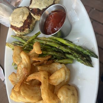 Whiskey & Oyster - Crab cakes with asparagus and sidewinder fries - Bars Near Me - Alexandria, Virginia
