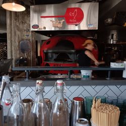 Roost - Look at that Oven, where Pizza magic Happens.