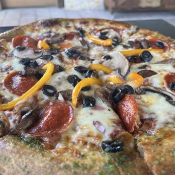 In Contrada Vineyard and Kitchen - The Kitchen Sink Pizza - Wine Tasting Room Near Me - San Antonio, Texas
