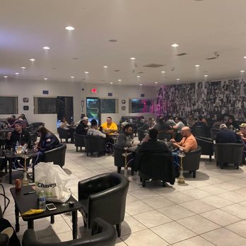 Teatro Hookah Lounge - a large group of people sitting at tables - Hookah Bars Near Me - Mason, Ohio Teatro Hookah Lounge - a large group of people sitting at tables - Hookah Bars Near Me - Mason, Ohio