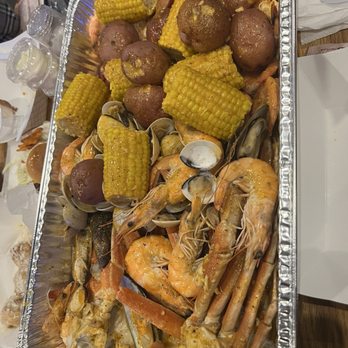 Boil Bay Seafood City - Food - Shrimp Head Off, Shrimp Head On, Potatoes, Corn, Snow Crab Legs, Mussels, Clams, Sausages - Cajun/Creole Near Me - Norfolk, Virginia Boil Bay Seafood City - Food - Shrimp Head Off, Shrimp Head On, Potatoes, Corn, Snow Crab Legs, Mussels, Clams, Sausages - Cajun/Creole Near Me - Norfolk, Virginia