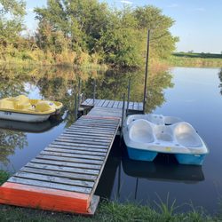 Prairie Oasis Campground & Cabins - Yes! The peddle boats are FREE to use on this beautiful lake/pond
